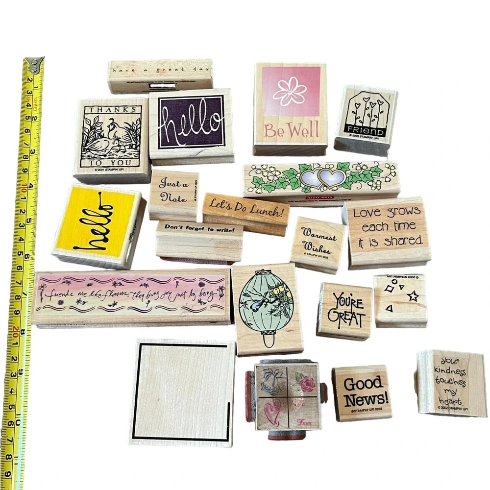 Lot of 20 rubber stamps. Most of the stamps are brand new.